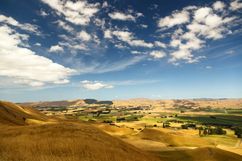 a hilly landscape is pictured in this image