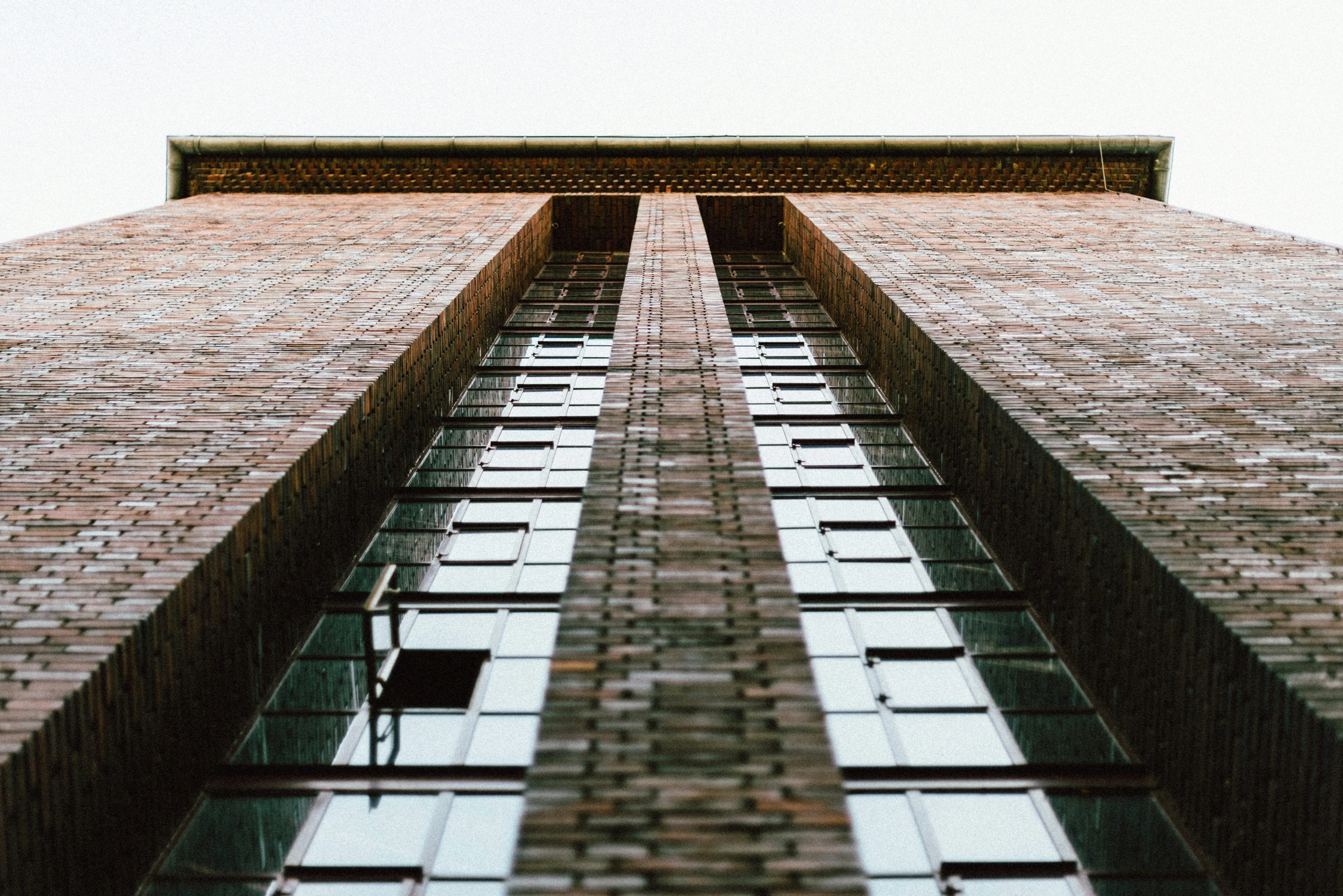 an image of a brick building with windows