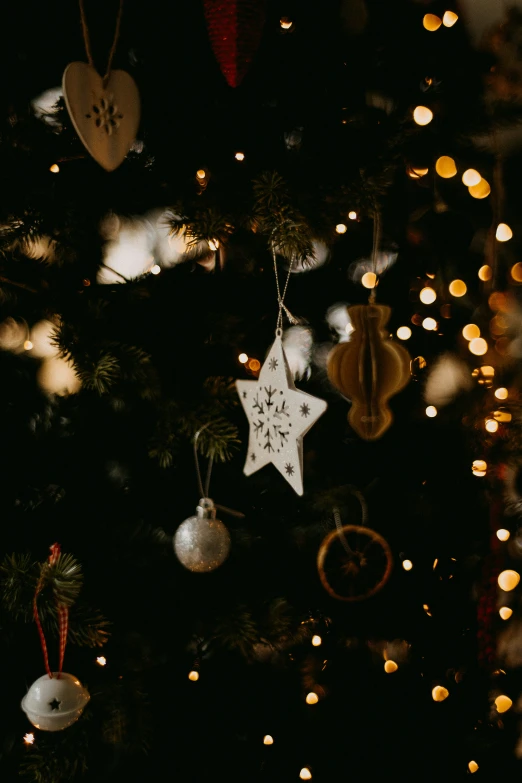 a christmas tree with decorations and lights