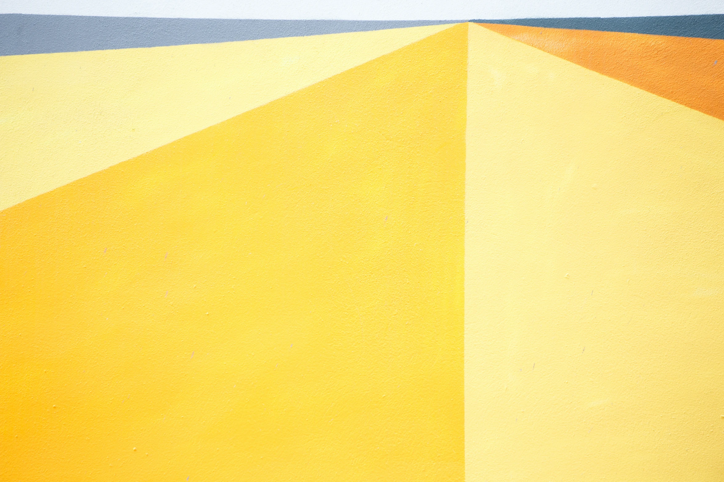 a painting of different colors and shapes, one of which is yellow and blue