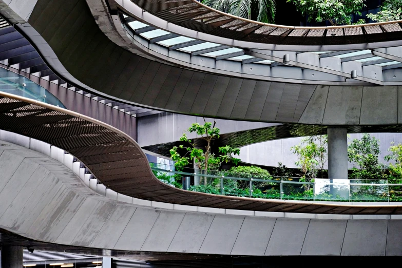 an interior view of a spiral stairway in a large building