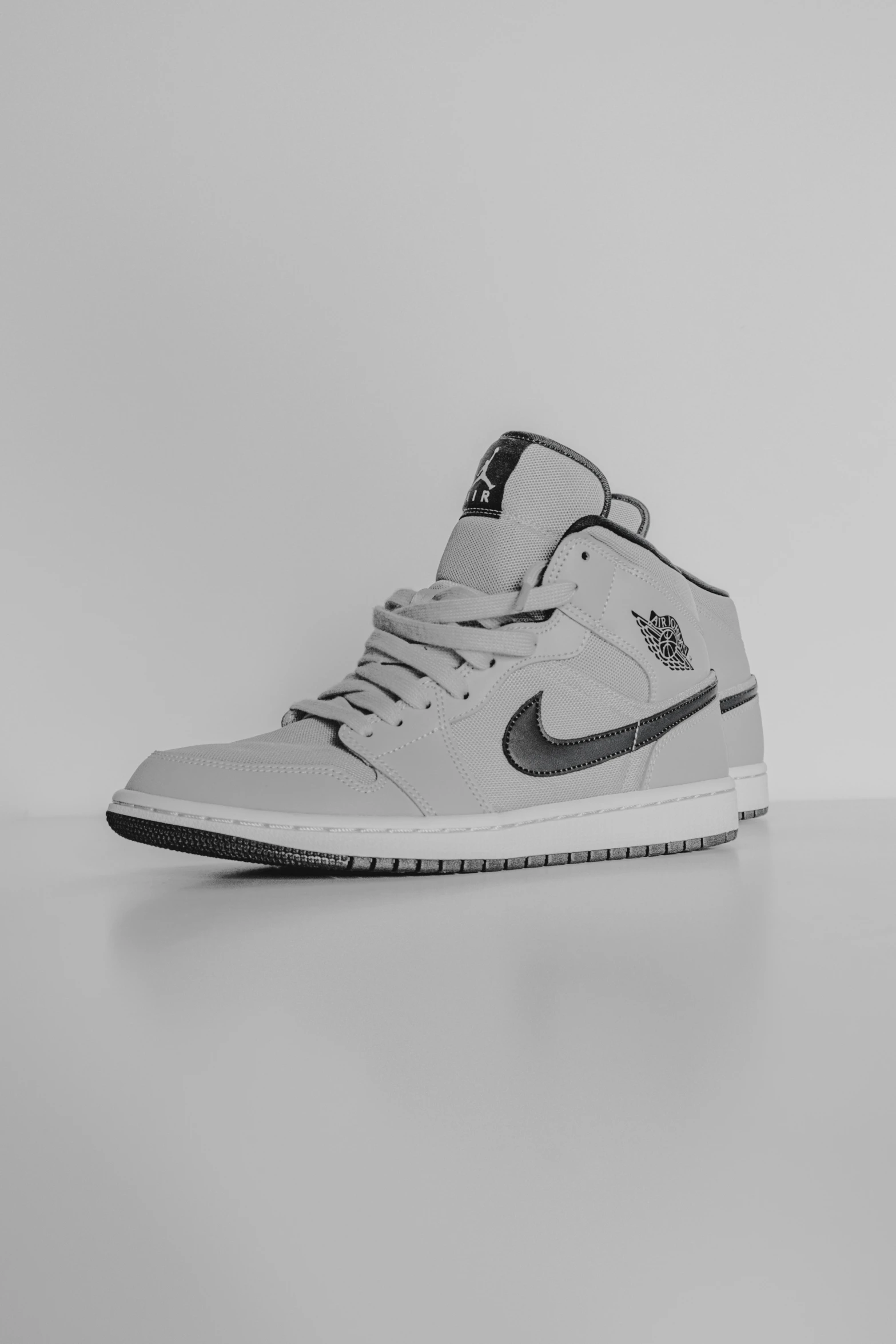 a pair of sneakers on a white background