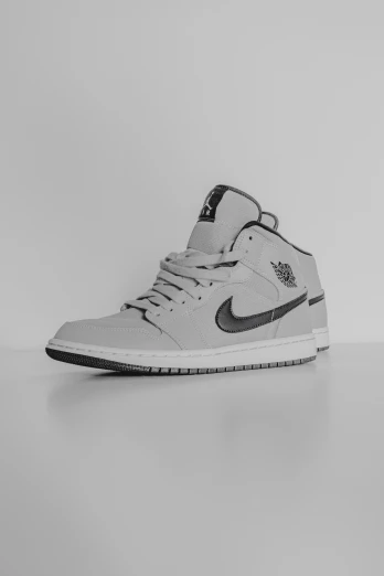 a pair of sneakers on a white background