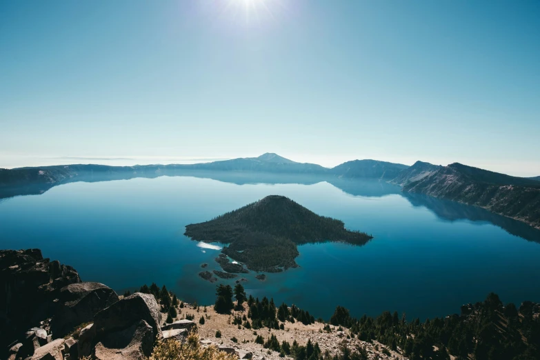 a mountain view of a lake and a mountain side