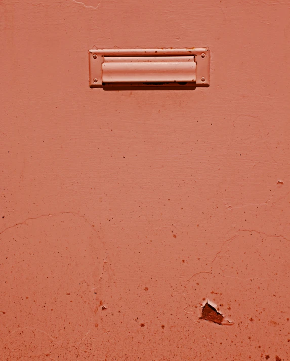 an object in the middle of a red floor