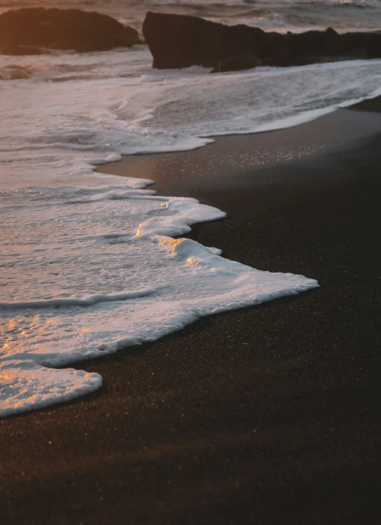 waves rolling on the beach, just after sunrise