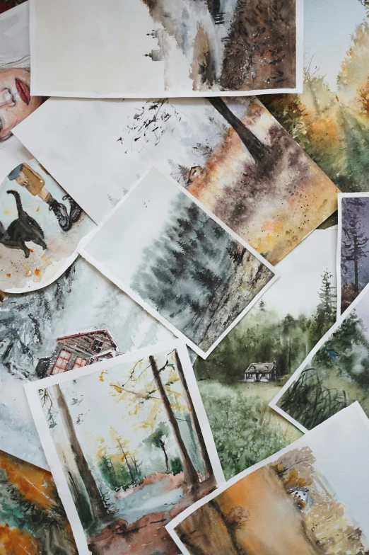 a bunch of pictures and a clock on a table