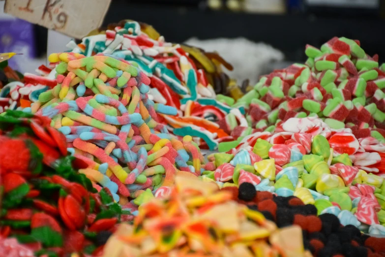 a large amount of colorful candy at a store