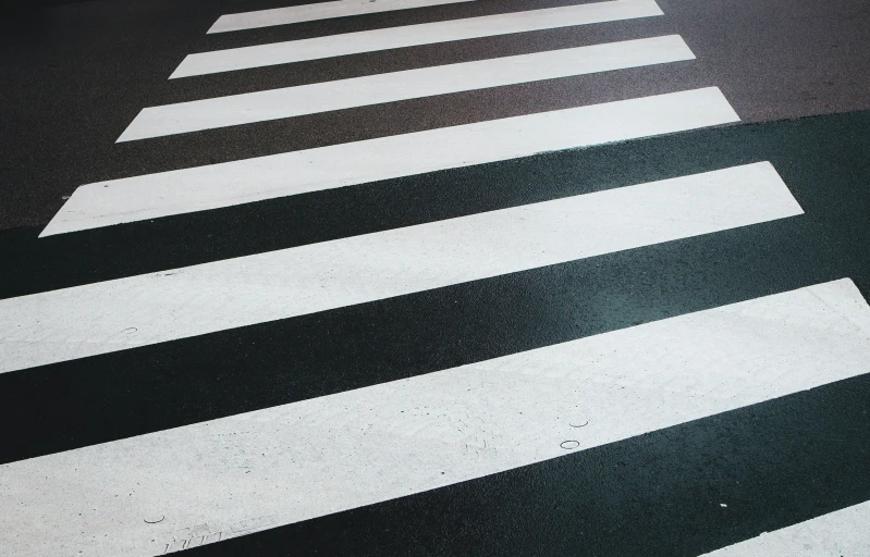 a black and white street with ze crossing on it