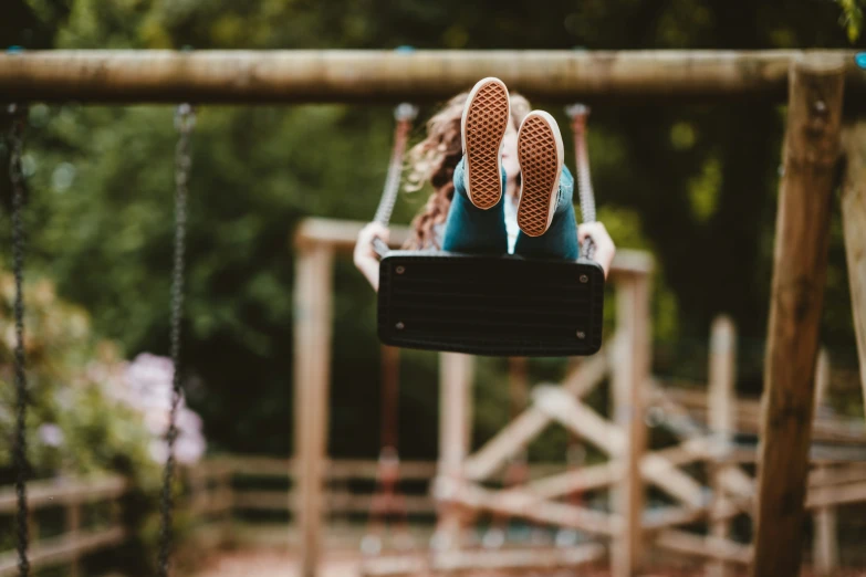 a person that is sitting on a bench