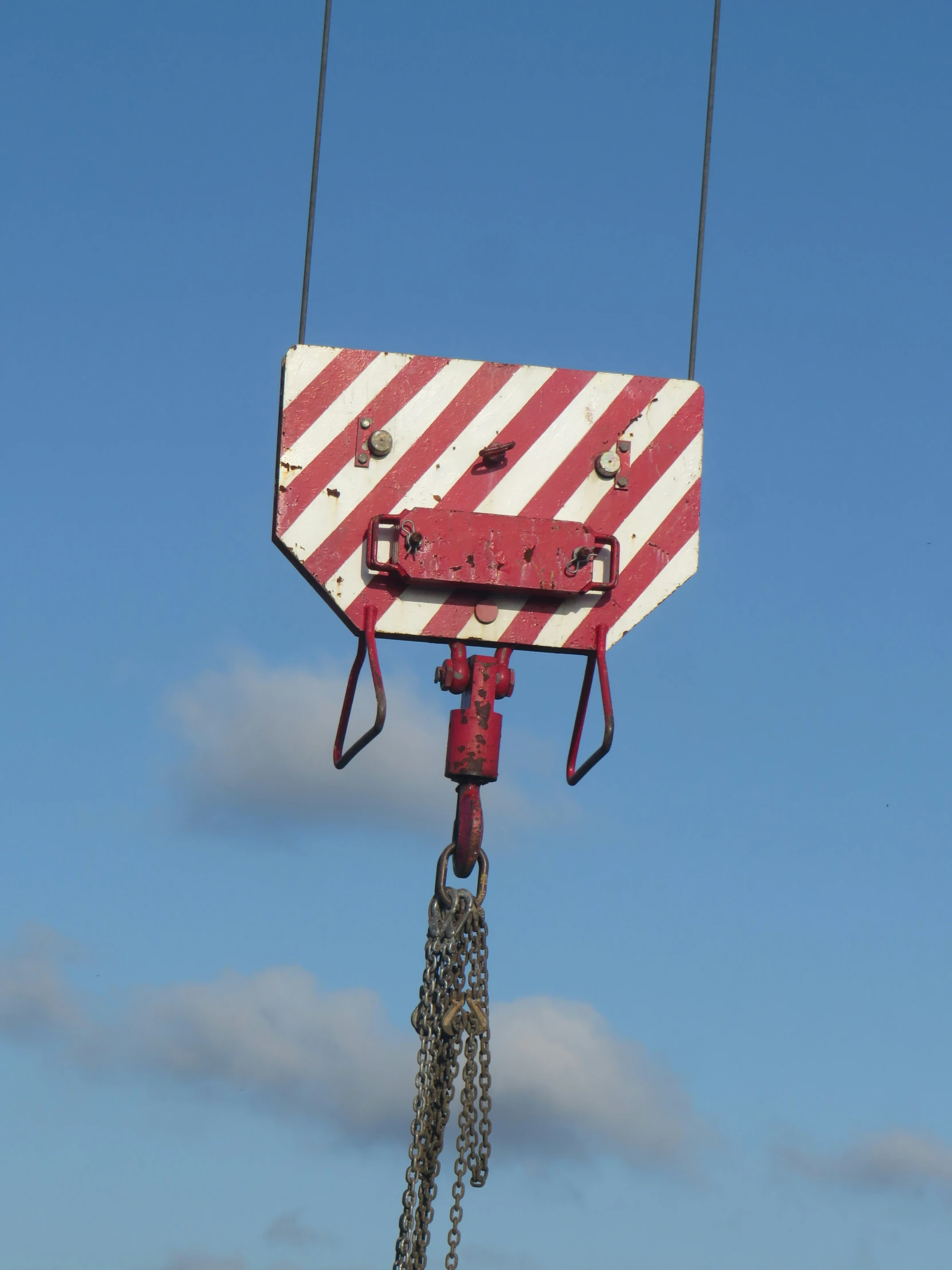 a crane is suspended from the side of a boat