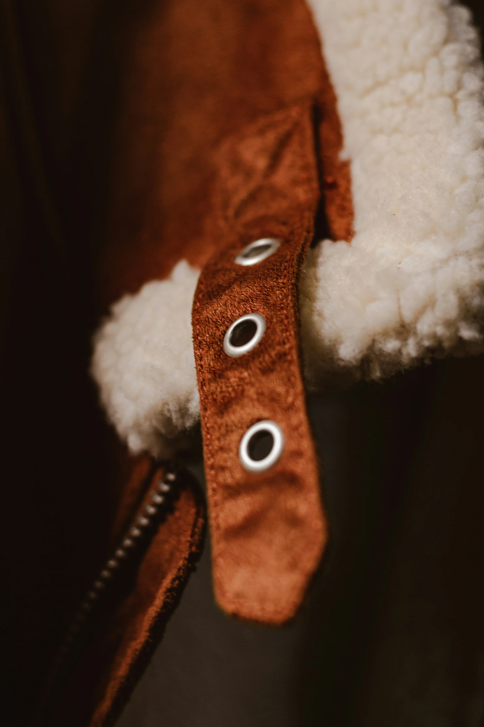 there is a close up view of a brown jacket