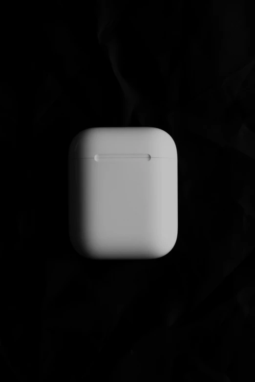 an apple airpods plugged into its charger