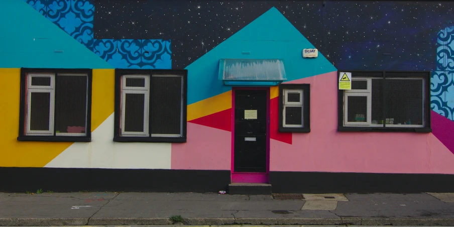 a house painted with an elaborate pattern and design