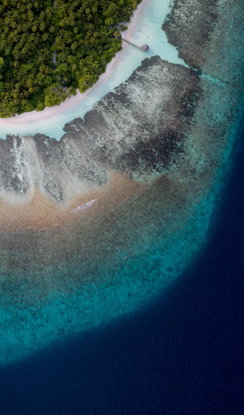 the aerial view shows blue water and sand beaches