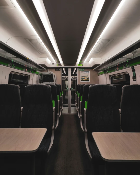 an empty bus car with lights and two seats