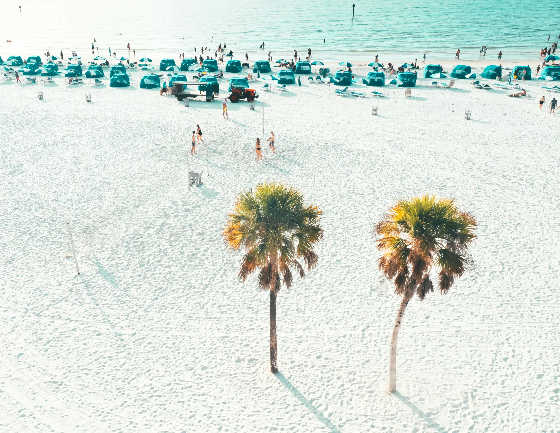 an image of beach scene with people on it