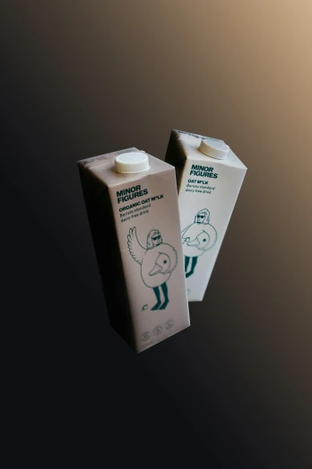 some milk cartons that are next to each other