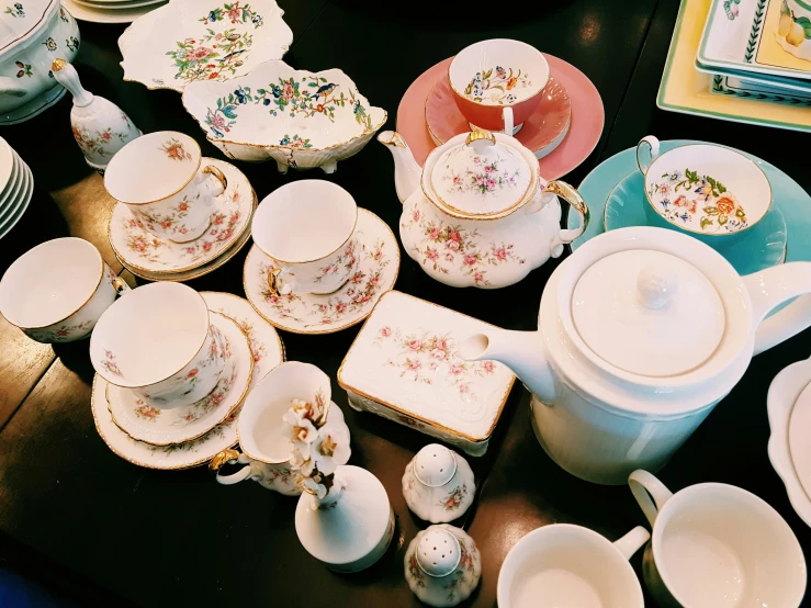 an assortment of royal albert china including tea pots and cups