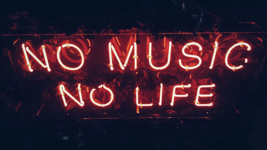 a neon sign that reads no music no life