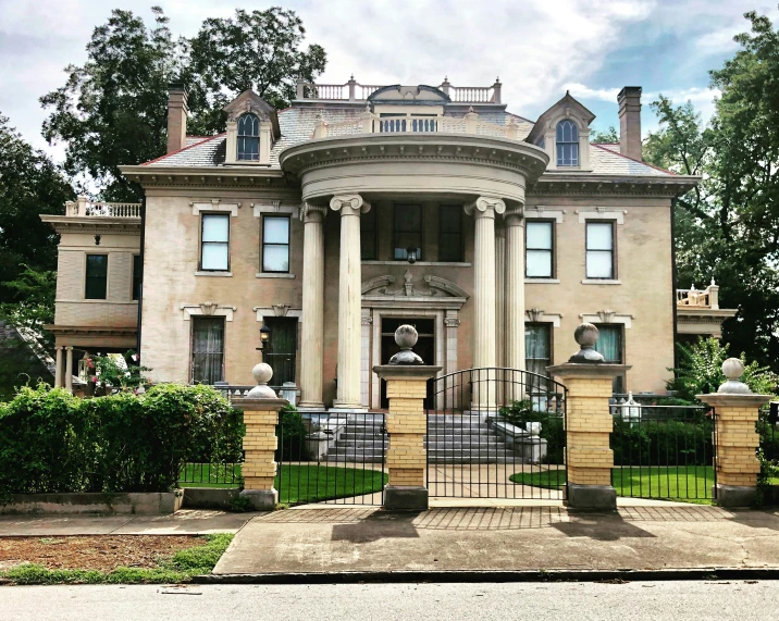 a home with a very big front fence