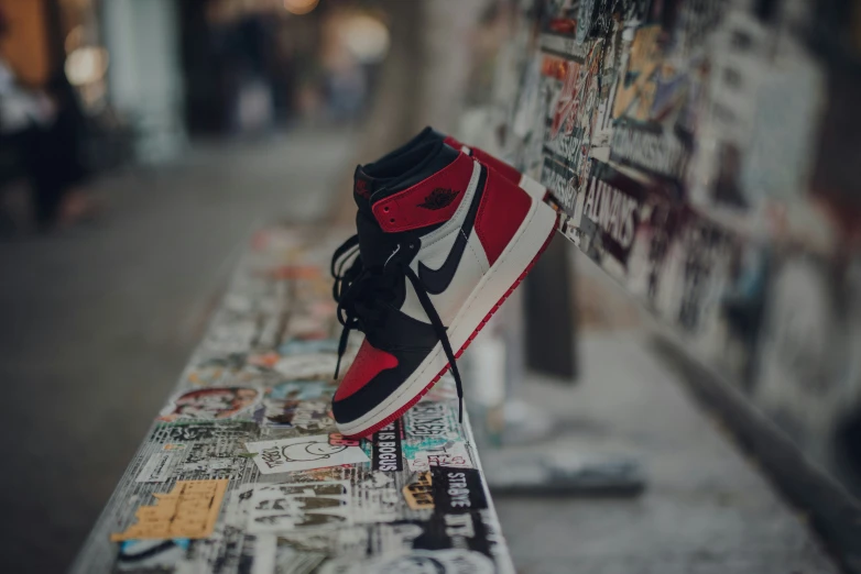 a pair of shoes is sitting on a bench