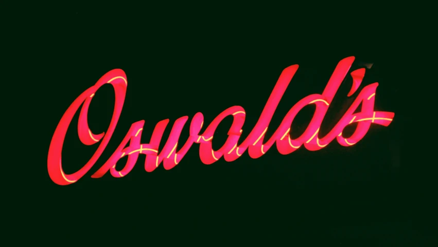 a neon sign that says'curvelds'lit up in pink