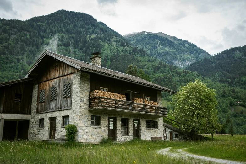 an old log cabin nestled in the valley