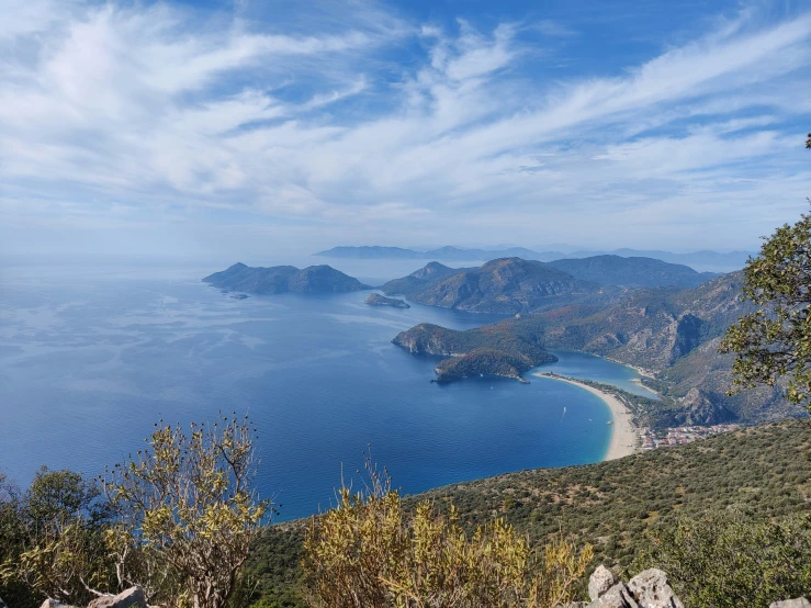 an aerial view of a lake and a beach