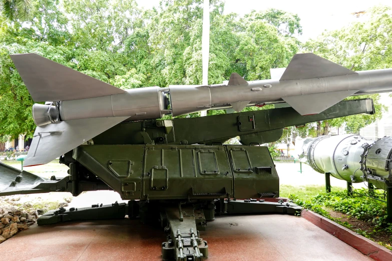 a military vehicle is on display in a museum