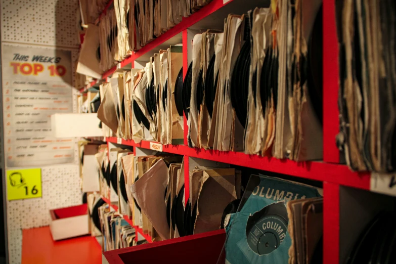 a wall is filled with lots of records