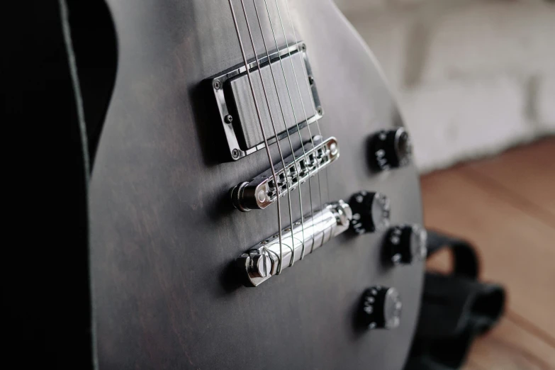 the front of an electric guitar with the pickupers visible