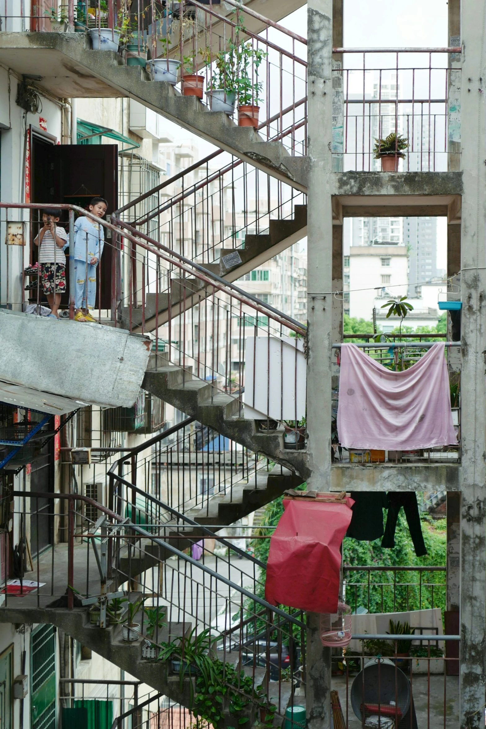 the apartment buildings have been constructed into stairs