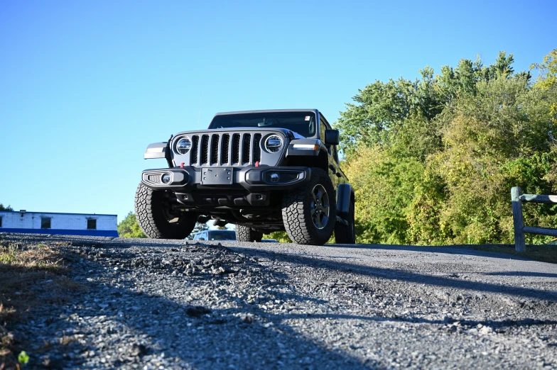 the jeep has been parked on the side of the road