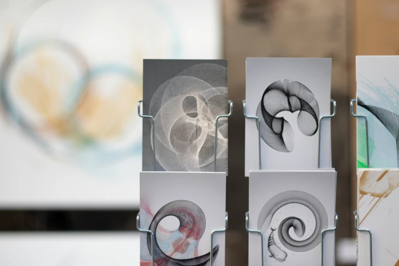 four different types of spirals displayed on a table