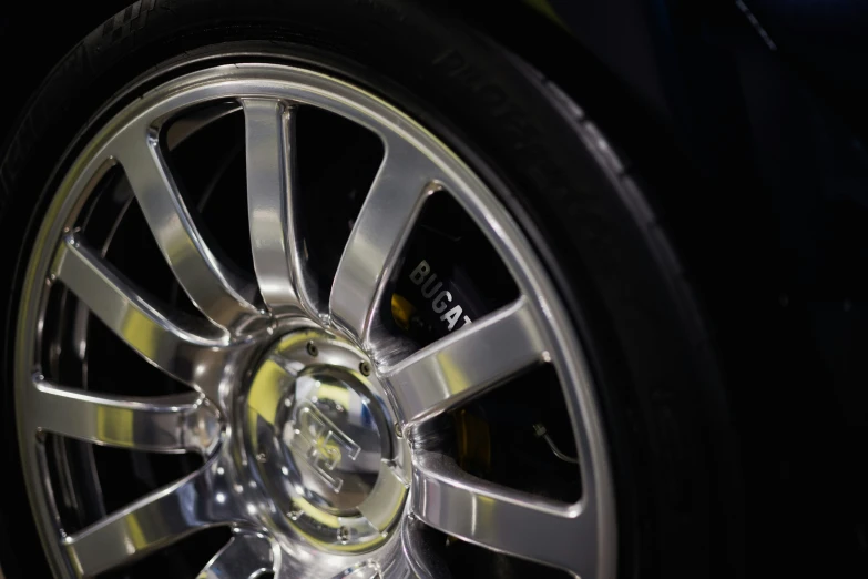 a close up view of a wheel on the wheels of a vehicle