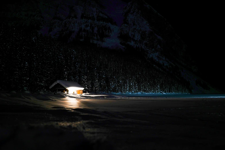 a dark snowy night at a snowy mountain resort