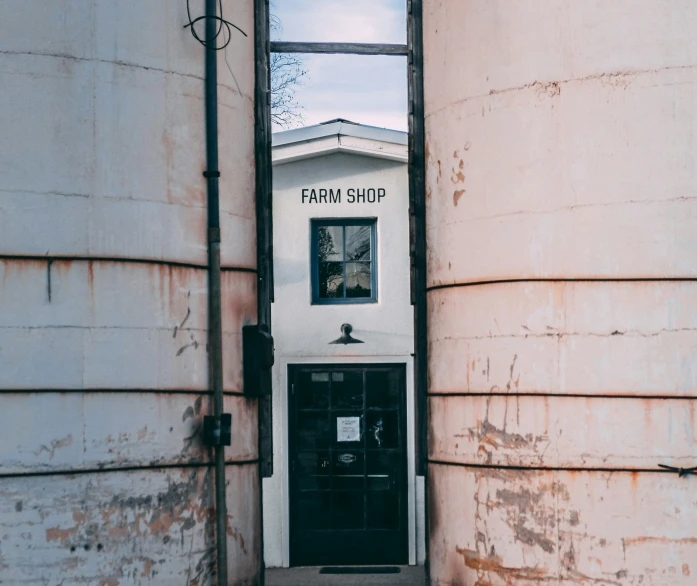 the entrance to a building with water on it