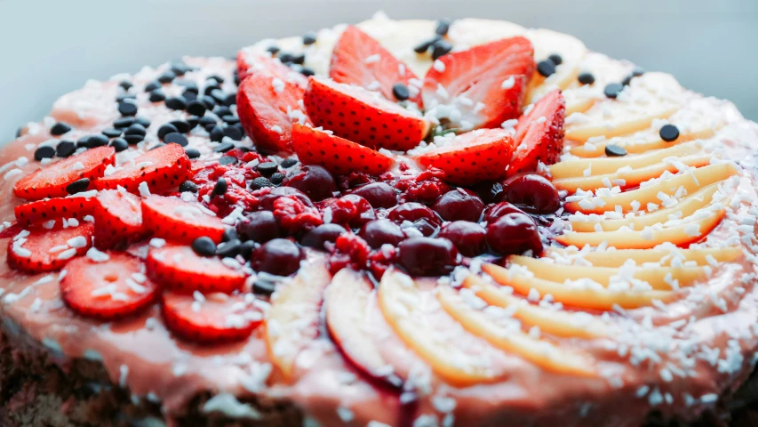 a desert that has fruit on it and powdered sugar on top