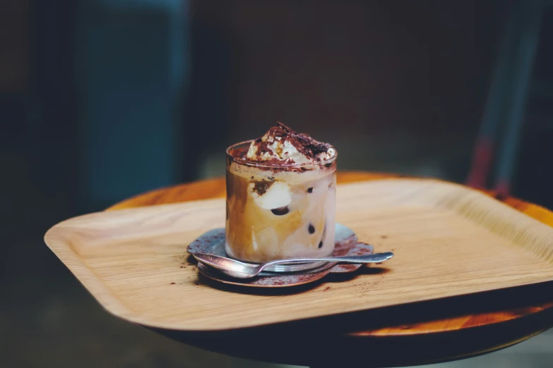 a glass filled with some kind of drink