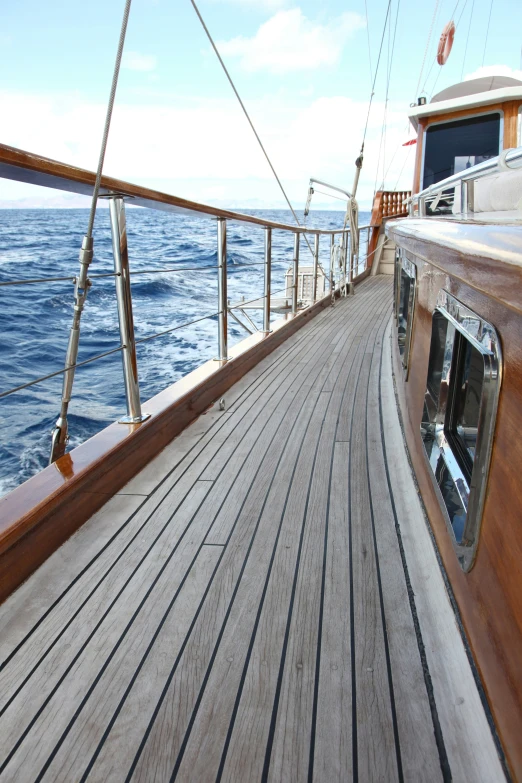 a view from a boat deck to the ocean