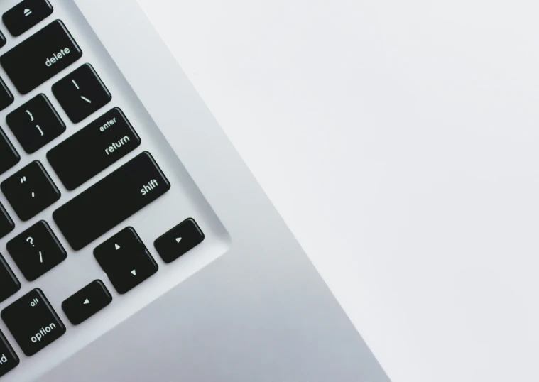 a keyboard on a computer keyboard, that is white and black