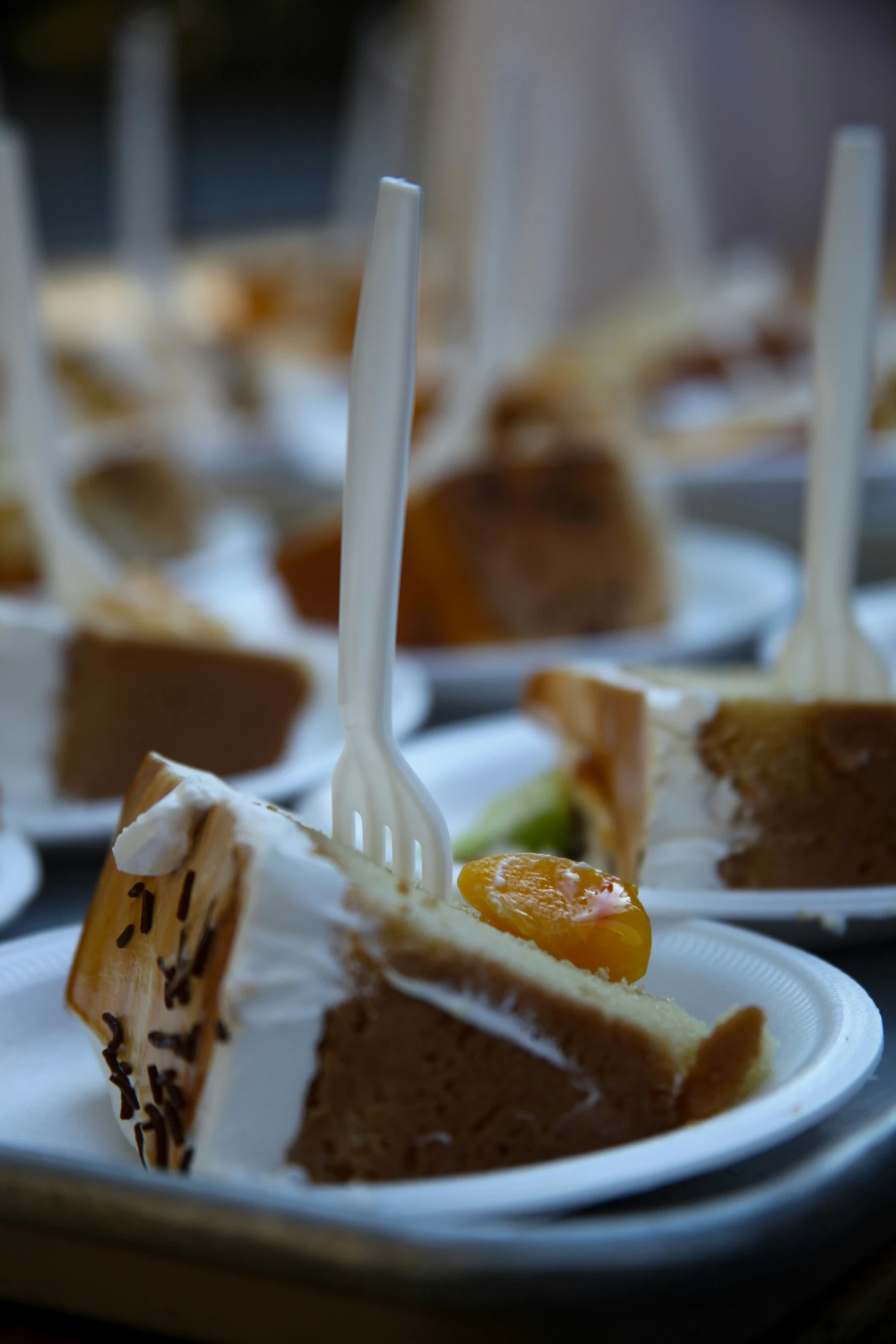 a dessert plate of cake on a table