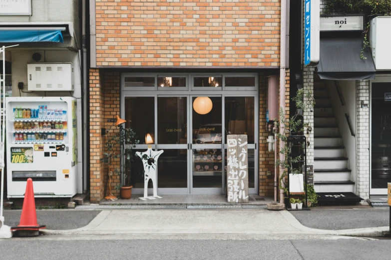 an asian shop with stairs and a sidewalk