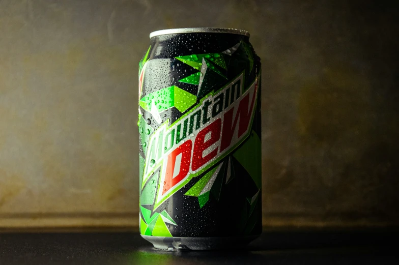 a can of mountain dew beer sitting on a table
