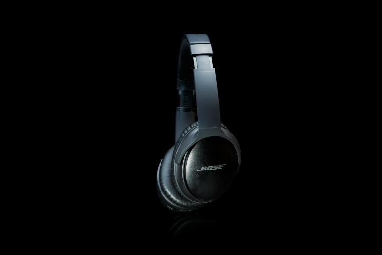 a pair of headphones on a black background