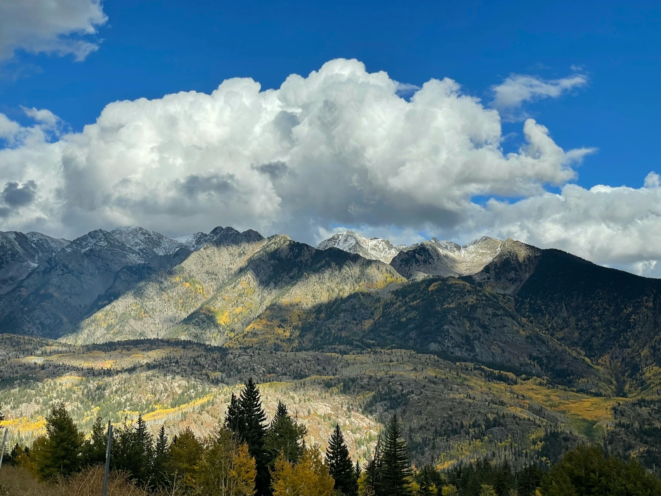 a big view of the mountains on a beautiful day