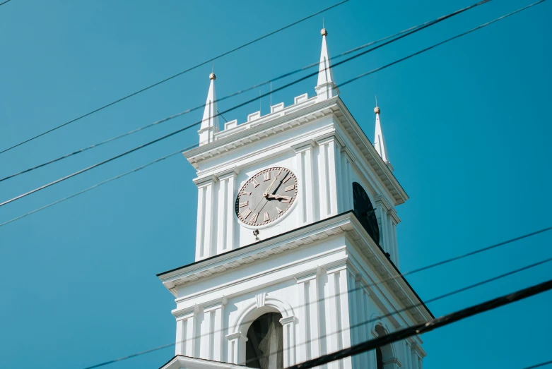 there is a clock tower built on the side of this building