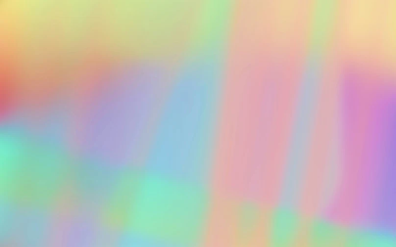 a blurry rainbow background with red, blue, and yellow lines
