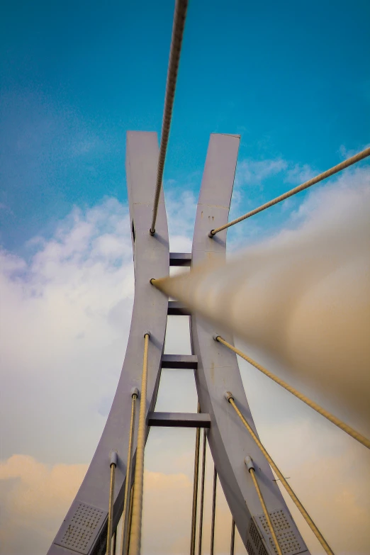 a view of the top of a tall bridge in the air